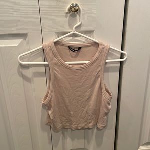 tan she in cropped tank